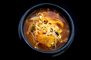Kimchee and bean sprout soup which is called kimchee kongnamul guk in Korean