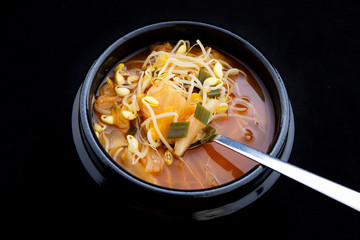 Kimchee and bean sprout soup which is called kimchee kongnamul guk in Korean