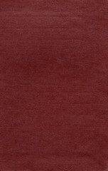 Artificial leather texture. Red old book cover. Rough surface with embossed. Blank retro page. Empty place for text. Perfect for background and vintage style design.
