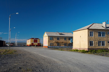 Street and buildings in the village of Tavayvaam, located in the suburbs of Anadyr. Chukotka, Far East of Russia.