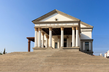 white building with columns in roman style