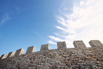 Typical castle defense stone wall from from the past time.