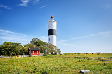 Fototapeta na wymiar The Lighthouse Lange Jan at the south cape of swedish island Oland in the Baltic Sea.