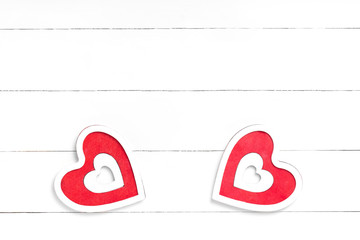 Valentines Day composition. Heart, gift on white wooden surface. Valentine's day concept. Flat lay, top view, from above, copy space