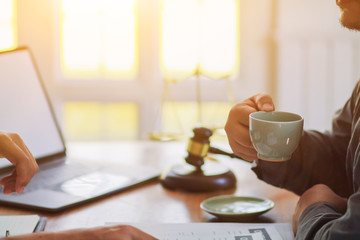 The lawyer is currently consulting on legal contract documents to be used as a contract between investors to sign a consent to invest in doing business together.