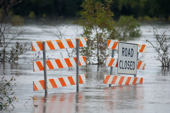 Flooding causes closures on a rural Iowa road.