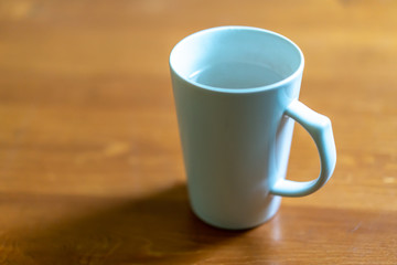 There is a glass of water on the table