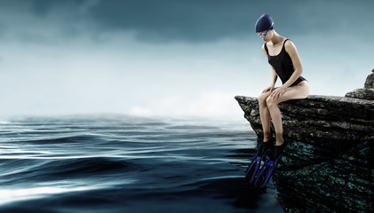 Fototapeta premium Swimmer woman at sea. Mixed media