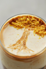 Coffee dessert, tree design on cream 