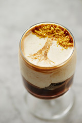 Coffee dessert, tree design on cream 