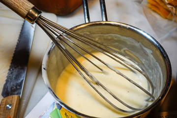 Fototapeta na wymiar A bechamel sauce used to make lasagne