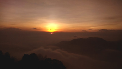 Fototapeta na wymiar Foggy sunrise while rainy season