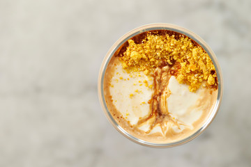 Coffee dessert, tree design on cream 