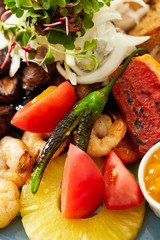 Beef steak, fruit, bread sauce on plate 