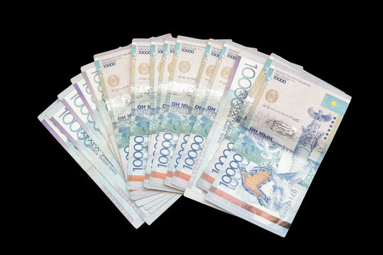 Money is a fan. Banknotes of the Kazakh national currency - tenge with a face value of 10,000