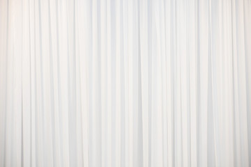  The white curtain that dropped down as a straight line.Background for inserting text on empty...