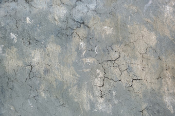Weathered old grey cracked background with rough surface.