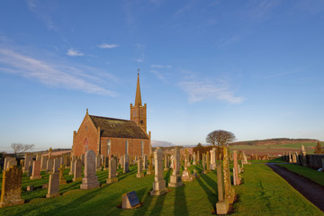 St Cyrus Parish church set back from the Cliffs of this old Fishing Village, with its simple design and extensive Graveyard in Winter.