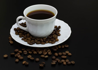 Obraz na płótnie Canvas cup of coffee with beans