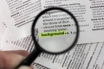 The word or phrase background in a dictionary.