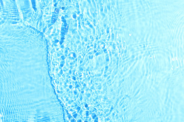 texture of splashing clean water on blue background