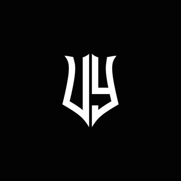 UY monogram letter logo ribbon with shield style isolated on black background