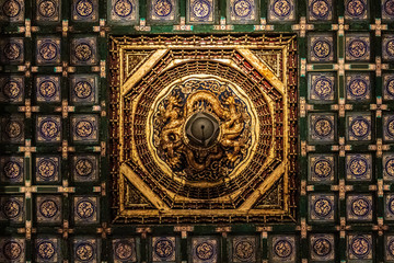 Ceiling of Forbidden City, with decoration of a golden dragon and dragon ball