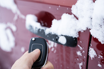 Man Trying To Open Frozen Car Door