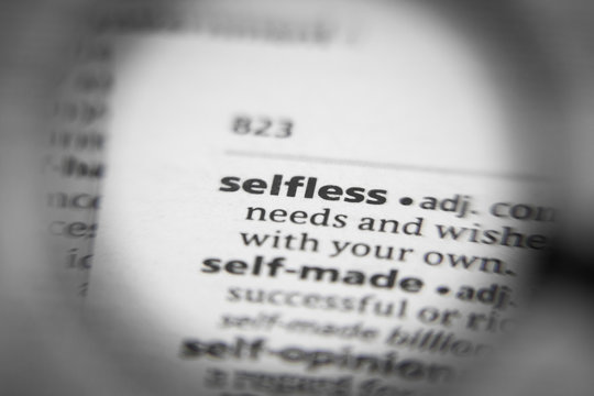 Word or phrase selfless in a dictionary.