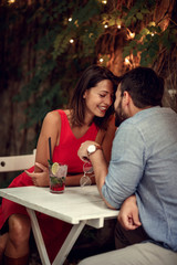 happy couple on date celebrating Valentines day.  Love and romance . elegant lovers having fun with...