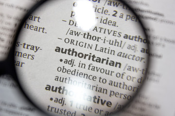 The word of phrase - authoritarian - in a dictionary.