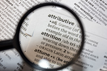 The word of phrase - attrition - in a dictionary. - 316330571
