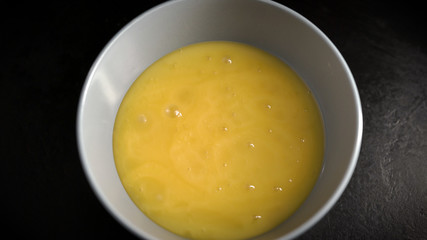 Ingredients and products in the kitchen. In a plate of natural bee honey.
