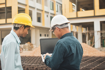 Businessman use computer talking on work site estate building construction