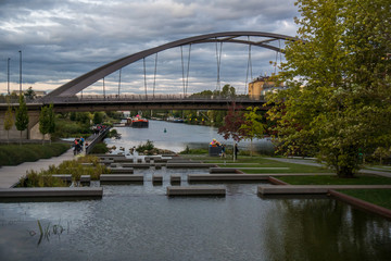 neckar river with steps and bridge