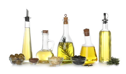 Different sorts of cooking oil and ingredients isolated on white