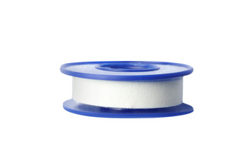 Medical sticking plaster roll isolated on white. First aid item