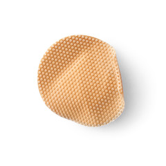 Used sticking plaster isolated on white, top view. First aid item