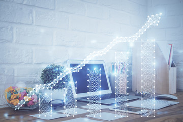 Financial graph colorful drawing and table with computer on background. Double exposure. Concept of international markets.