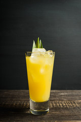 Pineapple cocktail in highball glass. Selective focus. Shallow depth of field.