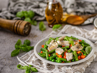 Fresh salad with roasted fish