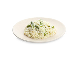 Delicious risotto with asparagus isolated on white