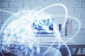 Multi exposure of business theme icons and work space with computer background. Concept of success.