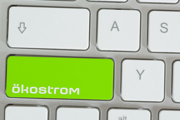 Ein Comouter und Taste für den Ökostrom