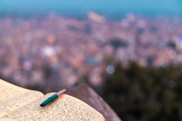 A journal notebook placed outdoors in open. selective focus.