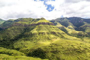 View over soft green mountains, on a sunny day, Drakensberg, Giants Castle Game Reserve, South Africa