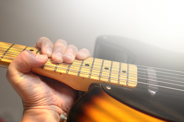  Electric guitar macro abstract, hand playing guitar