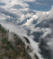 Nilgiri peak and cloudy Himalayas Monsoon time in Nepal