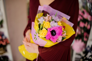 Close-up of bouquet with poppy in center