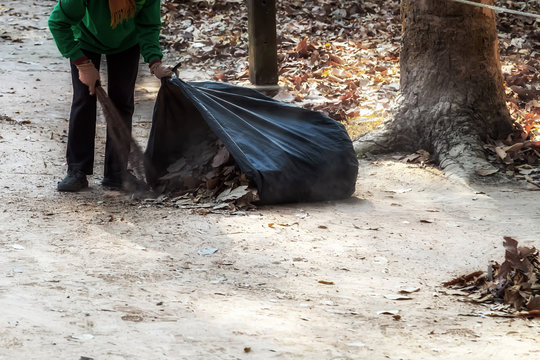 Cleaning service Angkor Wat complex Archaeological Park in Siem Reap